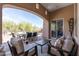 Beautiful outdoor patio with comfortable seating and desert views, perfect for relaxing and entertaining in style at 8974 E Rusty Spur Pl, Scottsdale, AZ 85255