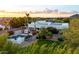 Aerial view of the property highlighting the backyard pool and solar panels at 9035 W Villa Chula --, Peoria, AZ 85383