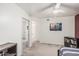 Spacious bedroom with adjoining door ways, neutral paint, and a ceiling fan at 9035 W Villa Chula --, Peoria, AZ 85383
