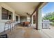 Spacious covered patio with an outdoor dining area, bar stools, and a BBQ grill at 9035 W Villa Chula --, Peoria, AZ 85383