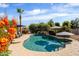 Inviting pool with a rock waterfall and plenty of space for outdoor entertaining at 9035 W Villa Chula --, Peoria, AZ 85383