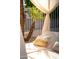 Close up on a poolside cabana featuring a WELCOME pillow and palm trees at 9035 W Villa Chula --, Peoria, AZ 85383