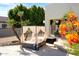 Inviting poolside cabana nestled in lush landscaping with a view of the covered patio at 9035 W Villa Chula --, Peoria, AZ 85383
