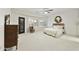 Spacious bedroom with large window, ceiling fan, and lots of natural light at 9517 E Minton St, Mesa, AZ 85207