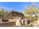 Welcome to Boulder Mountain! A stone monument marks the entrance to this desert community at 9517 E Minton St, Mesa, AZ 85207