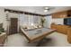 Spacious game room with a pool table, wall decor, and large windows at 9517 E Minton St, Mesa, AZ 85207