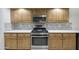 Stylish kitchen has stainless steel appliances and sleek countertops with backsplash at 9517 E Minton St, Mesa, AZ 85207