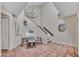 Dining room features a chandelier and a staircase, creating an inviting ambiance at 9807 N 5Th St, Phoenix, AZ 85020