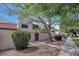 Charming two-story home with a private courtyard, mature tree and lush desert landscaping at 9807 N 5Th St, Phoenix, AZ 85020