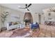 Bright living room with unique fireplace, tile flooring, and modern furniture at 9807 N 5Th St, Phoenix, AZ 85020