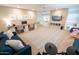 Large bonus room with ceiling fan, computer, TV, seating and play area for the  at 1132 E Sheffield Ave, Chandler, AZ 85225