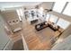 Spacious open-concept living area with hardwood floors, modern kitchen, and comfortable seating at 1132 E Sheffield Ave, Chandler, AZ 85225