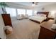 Spacious main bedroom features neutral tones, multiple windows, and ample closet space at 1132 E Sheffield Ave, Chandler, AZ 85225