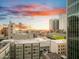 Elevated city view showcasing a dynamic cityscape with high-rise buildings and telecommunications towers at 114 W Adams St # Ph, Phoenix, AZ 85003