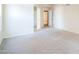 Bedroom boasting neutral walls, carpet flooring, and access to closet and bathroom at 1227 E Sheena Dr, Phoenix, AZ 85022