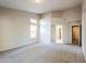 Expansive primary bedroom boasting neutral walls, carpet flooring, and abundant natural light at 1227 E Sheena Dr, Phoenix, AZ 85022