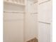 Spacious walk-in closet featuring built-in shelving and bars for optimal organization at 1227 E Sheena Dr, Phoenix, AZ 85022