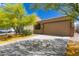 Charming single-story home with beautiful desert landscaping and a spacious two-car garage at 12565 W Palmaire Ave, Glendale, AZ 85307