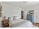 Cozy bedroom with neutral tones, wood floors, and natural light at 1306 W Heatherbrae Dr, Phoenix, AZ 85013
