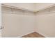 Bright closet with white shelving and wooden floor at 14402 N 58Th Dr, Glendale, AZ 85306