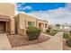 Delightful exterior highlighting the well-kept grounds and architectural details of this inviting home at 14402 N 58Th Dr, Glendale, AZ 85306