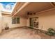 Spacious patio with a ceiling fan, stucco walls and sliding door at 14402 N 58Th Dr, Glendale, AZ 85306