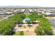 Community park aerial, featuring playground and picnic areas amongst mature shade trees at 14408 W Bloomfield Rd, Surprise, AZ 85379