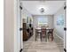 Bright dining space featuring contemporary decor, comfortable seating and natural light at 14408 W Bloomfield Rd, Surprise, AZ 85379