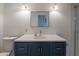 Fresh bathroom featuring a modern vanity, ample counter space, and updated fixtures and accessories at 14624 N 44Th St, Phoenix, AZ 85032