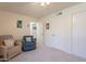 Comfortable bedroom featuring plush seating and ample closet space, perfect for relaxation and storage at 14624 N 44Th St, Phoenix, AZ 85032