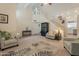 Spacious living room showcasing vaulted ceilings, an open layout and neutral decor at 14624 N 44Th St, Phoenix, AZ 85032