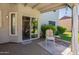 Enclosed patio featuring dining and lounge seating, perfect for relaxation or entertaining at 14624 N 44Th St, Phoenix, AZ 85032