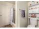 Bathroom featuring toilet, bath tub with shower, linen storage, and neutral finishes at 1535 N Horne -- # 67, Mesa, AZ 85203
