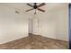 Bright bedroom with a ceiling fan, closet, and neutral color scheme that creates a calming atmosphere at 1535 N Horne -- # 67, Mesa, AZ 85203