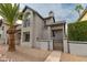Charming two-story home featuring unique architectural details and a well-maintained front yard with desert landscaping at 1535 N Horne -- # 67, Mesa, AZ 85203