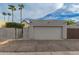 Two-car garage with a neutral tone complementing the home's exterior at 1535 N Horne -- # 67, Mesa, AZ 85203