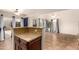 Bright living space with tile flooring, complemented by a bar area and large windows at 1535 N Horne -- # 67, Mesa, AZ 85203