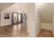 Bright living room featuring tile floors, a ceiling fan, and a large bay window at 1535 N Horne -- # 67, Mesa, AZ 85203