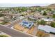 Scenic aerial view of the neighborhood featuring solar panels, lush greenery, and desert landscaping at 1550 W Willow Ave, Phoenix, AZ 85029