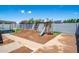 The backyard has a play structure, pool and grassy area at 1550 W Willow Ave, Phoenix, AZ 85029