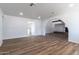 Open-concept living room with modern flooring and lots of natural light at 1550 W Willow Ave, Phoenix, AZ 85029