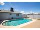 Sparkling private pool features a refreshing escape with cool deck and backyard privacy fencing at 1550 W Willow Ave, Phoenix, AZ 85029