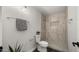 Contemporary bathroom features a tiled shower, a toilet and modern fixtures at 1615 E Fremont Dr, Tempe, AZ 85282