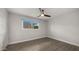Bright bedroom with hardwood floors, a ceiling fan, and natural light at 1615 E Fremont Dr, Tempe, AZ 85282