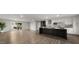 Open concept kitchen flowing into the living area with stainless steel appliances and lots of counter space at 1615 E Fremont Dr, Tempe, AZ 85282