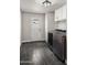 A well lit laundry room with modern washer and dryer and tile flooring at 1615 E Fremont Dr, Tempe, AZ 85282