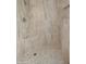 Close-up of tiled shower with stone tile flooring, built-in seat and shower niche at 1615 E Fremont Dr, Tempe, AZ 85282