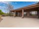 Extended backyard patio with overhang, providing comfortable outdoor living with desert views at 18 E Paint Your Wagon Trl, Phoenix, AZ 85085