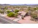 Charming single-story home with tile roof, desert landscaping, and a paved driveway at 18 E Paint Your Wagon Trl, Phoenix, AZ 85085