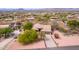 Desert home featuring a well-maintained tile roof and desert landscaping at 18 E Paint Your Wagon Trl, Phoenix, AZ 85085